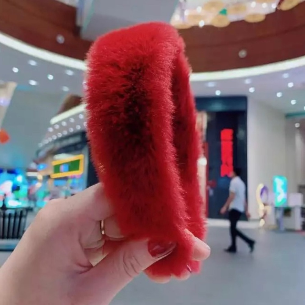 pinkish/red furry headband